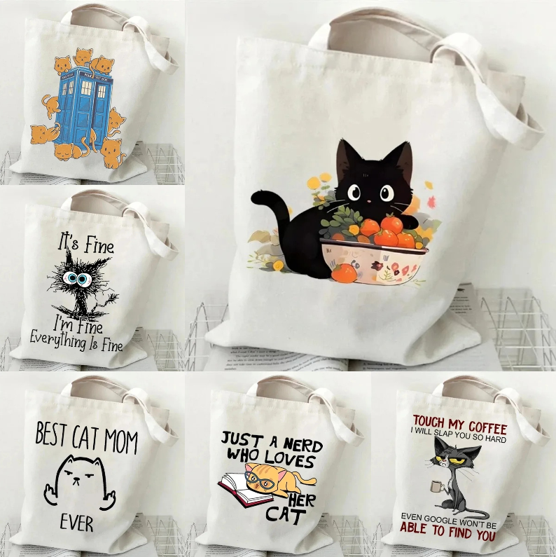 Cat and Book Canvas Handbag La - Tote Bag Canvas Print recensie en prijs